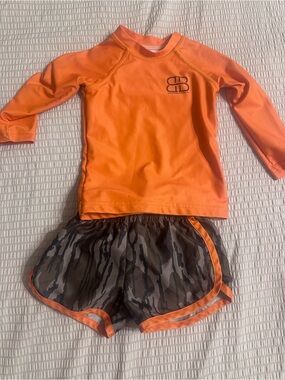 Kids Orange Rash Guard Top and Camo Swim Trunks Set
